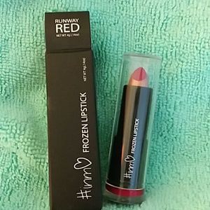 INMO Beauty "Runway Red" lipstick.